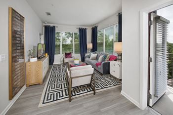 Separate Living Area and Balcony at Apartments near Cumberland GA